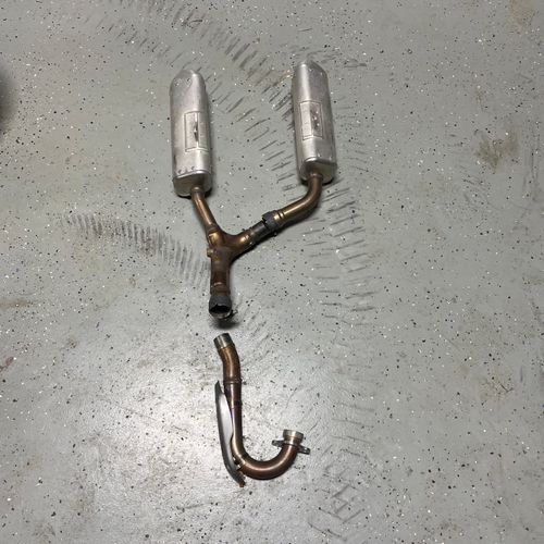 OEM HONDA CRF250R exhaust system.