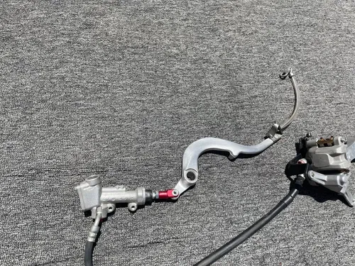 KAWASAKI KX250F KX 250 F REAR BRAKE ASSEMBLY COMPLETE OEM master cylinder 1