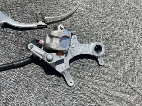 KAWASAKI KX250F KX 250 F REAR BRAKE ASSEMBLY COMPLETE OEM master cylinder 1