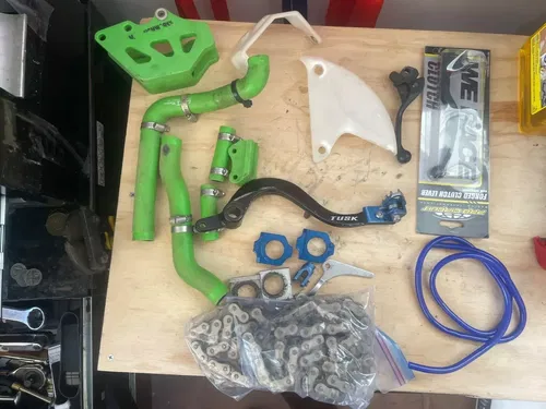 2006 KX250  Parts lot radiator hoses chain chain block brake lever clutch