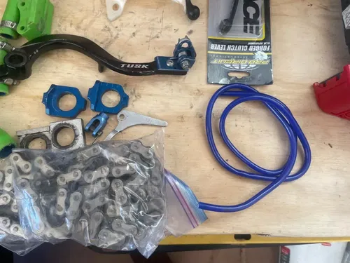 2006 KX250  Parts lot radiator hoses chain chain block brake lever clutch