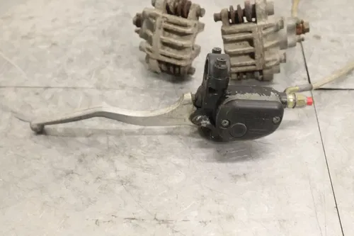 2005 POLARIS PREDATOR 500 OEM LEFT FRONT BRAKE CALIPER 1910689