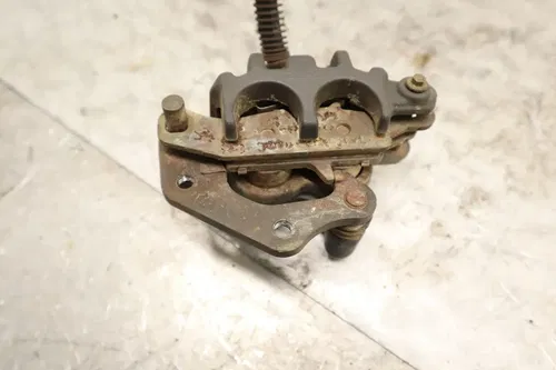 2002 Kawasaki Prairie 650 KVF650A 4x4 OEM LEFT FRONT BRAKE CALIPER