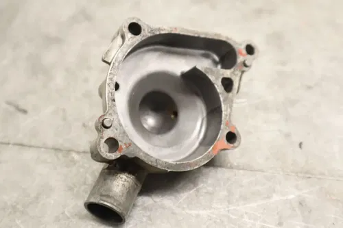 2002 KAWASAKI PRAIRIE 650 KVF650A 4X4 OEM ENGINE WATER COOLANT PUMP COVER 16142-