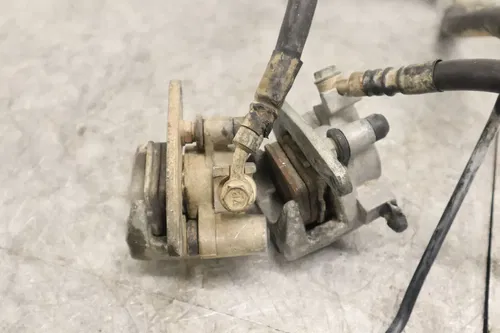 2003 SUZUKI QUADSPORT Z400 LTZ400 2X4 OEM RIGHT LEFT FRONT BRAKE CALIPER