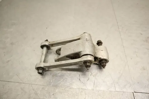 1986 KAWASAKI KX125 OEM REAR DOGBONE SHOCK LINKAGE LINK 39007-1090
