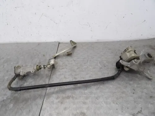 2009 KAWASAKI KX450F OEM REAR BACK BRAKE CALIPER ASSY.