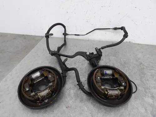 1997 HONDA RECON 250 TRX250 2X4 OEM RIGHT FRONT BRAKE ASSY.