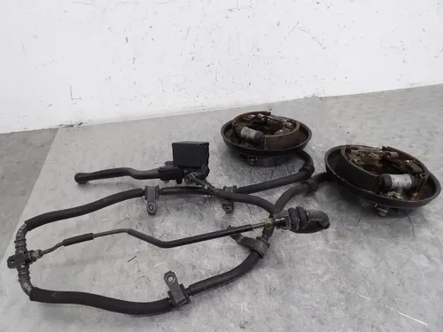 1997 HONDA RECON 250 TRX250 2X4 OEM RIGHT FRONT BRAKE ASSY.