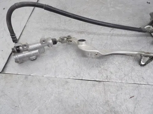 2006 HONDA CRF250X REAR BACK BRAKE CALIPER ASSY.