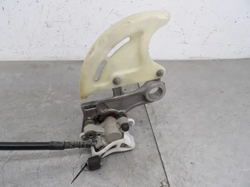 2006 HONDA CRF250X REAR BACK BRAKE CALIPER ASSY.