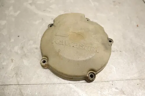 1990 KAWASAKI KX125 ENGINE MOTOR STATOR GENERATOR MAGNETO COVER 14031-1217