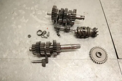 1990 KAWASAKI KX125 OEM ENGINE TRANSMISSION TRANNY ASSEMBLY GEARS 13128-1163