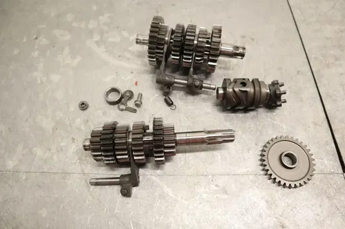 1990 KAWASAKI KX125 OEM ENGINE TRANSMISSION TRANNY ASSEMBLY GEARS 13128-1163