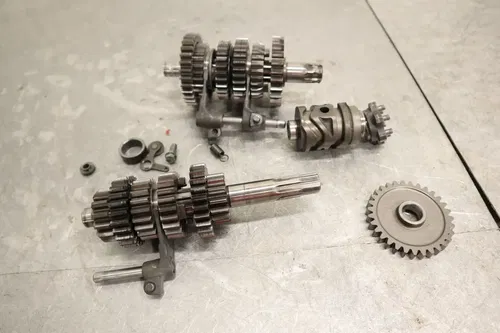 1990 KAWASAKI KX125 OEM ENGINE TRANSMISSION TRANNY ASSEMBLY GEARS 13128-1163