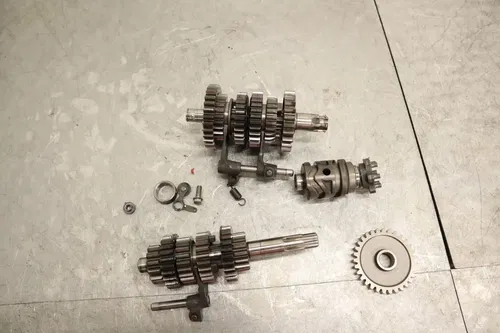 1990 KAWASAKI KX125 OEM ENGINE TRANSMISSION TRANNY ASSEMBLY GEARS 13128-1163