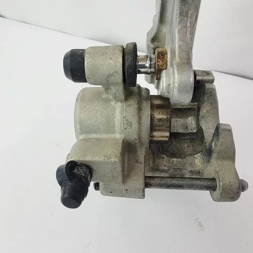 2004 04-06 Suzuki RMZ 250 Rear Brake Nissin Caliper Hanger Good K4308-00037 OEM