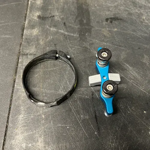 Tamer Double Button Holeshot Device