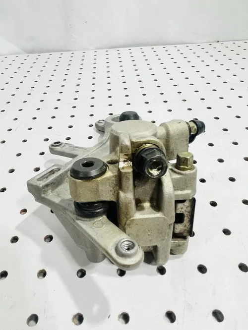 Honda CRF450X - Stock Rear Brake Caliper w/ Pads - 2005 CRF 450 OEM