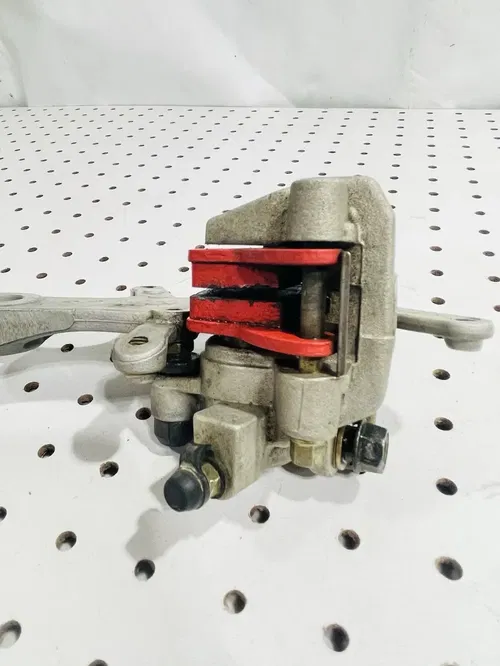 Honda CRF450X - Stock Rear Brake Caliper w/ Pads - 2005 CRF 450 OEM