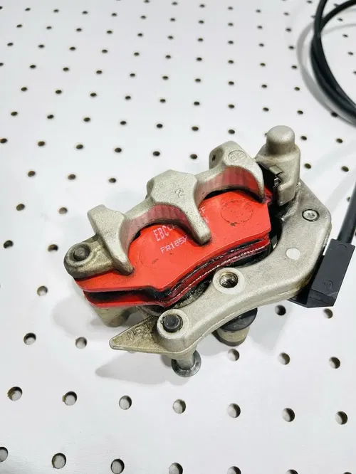 Honda CRF450X - Stock Front Brake Caliper w/ Pads Nissin - 2005 CRF 450 OEM