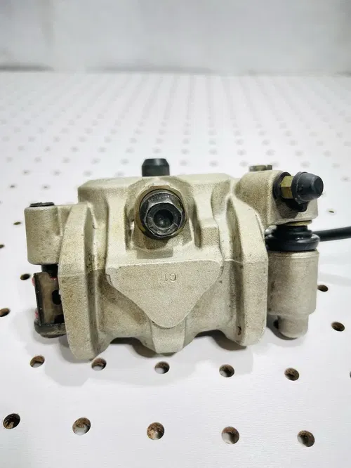 Honda CRF450X - Stock Front Brake Caliper w/ Pads Nissin - 2005 CRF 450 OEM