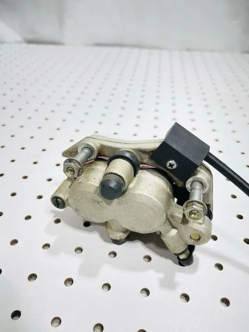 Honda CRF450X - Stock Front Brake Caliper w/ Pads Nissin - 2005 CRF 450 OEM