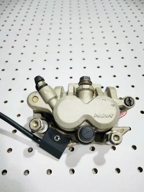 Honda CRF450X - Stock Front Brake Caliper w/ Pads Nissin - 2005 CRF 450 OEM