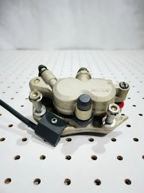 Honda CRF450X - Stock Front Brake Caliper w/ Pads Nissin - 2005 CRF 450 OEM
