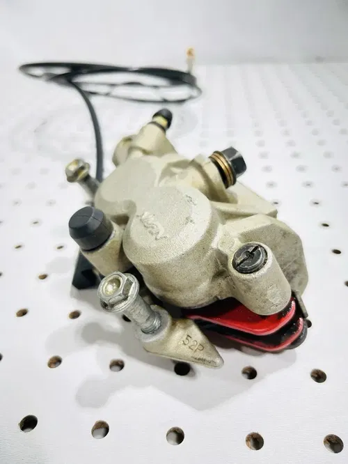 Honda CRF450X - Stock Front Brake Caliper w/ Pads Nissin - 2005 CRF 450 OEM