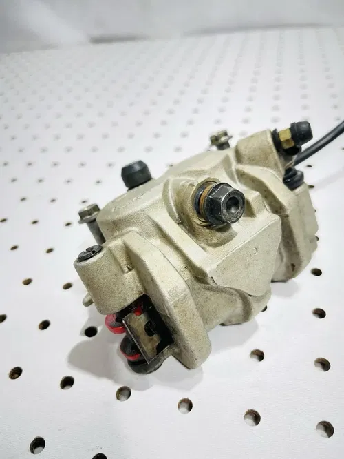 Honda CRF450X - Stock Front Brake Caliper w/ Pads Nissin - 2005 CRF 450 OEM