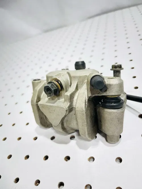 Honda CRF450X - Stock Front Brake Caliper w/ Pads Nissin - 2005 CRF 450 OEM