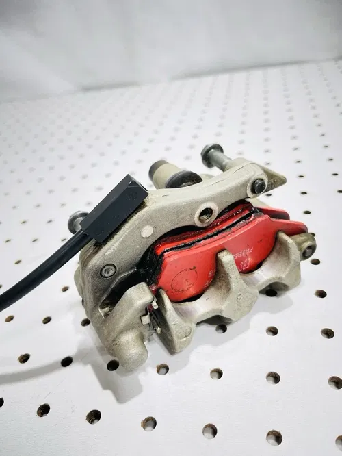 Honda CRF450X - Stock Front Brake Caliper w/ Pads Nissin - 2005 CRF 450 OEM