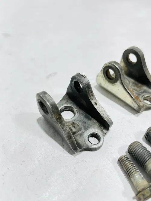 Honda CRF450R - Stock Foot Peg Mounts Brackets Set - 2008 CRF450 OEM