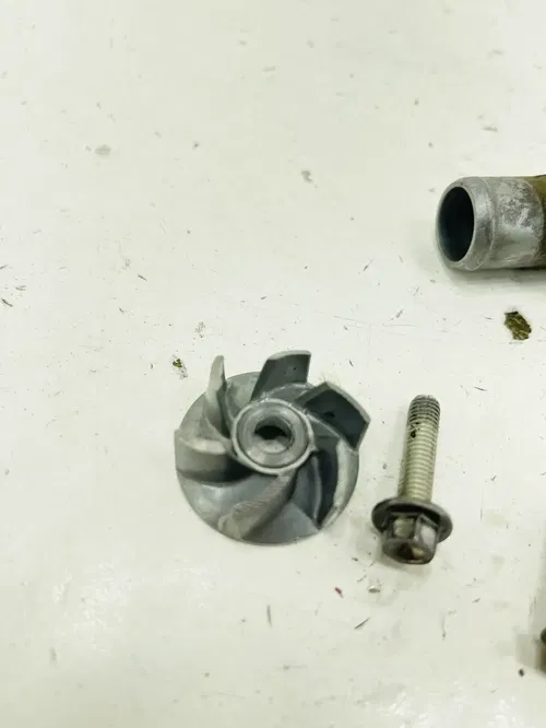 Kawasaki KX450F - Stock Water Pump Impeller Shaft  Cover - 2013 KX 450 OEM