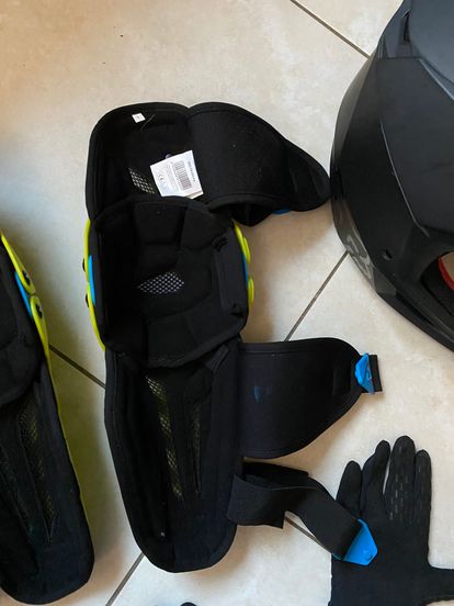 Fox Racing V1 Helmet, Leatt Knee Pads, Spy Goggles, 100% Gloves