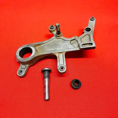 CRF450R Rear Brake Caliper Mount Bracket GENUINE OEM HONDA CRF 450 R (05-08)