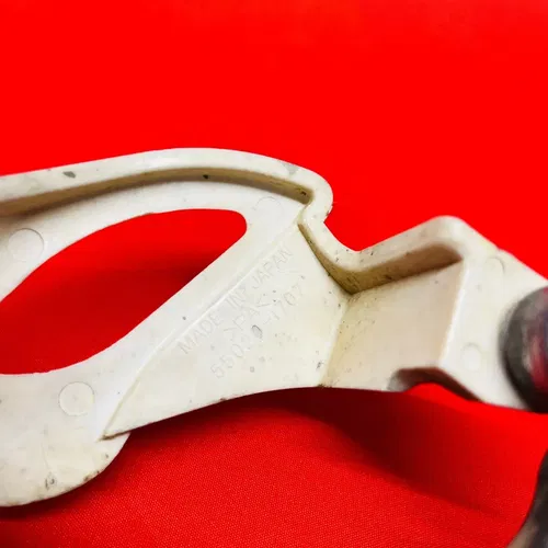KX65 REAR CALIPER MOUNT BRACKET HANGER GENUINE OEM KAWASAKI RM KX 65 (2002-2022)