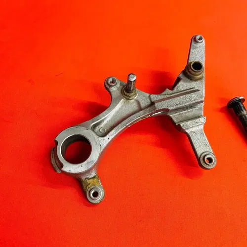 KX250F Rear Brake Caliper Mount Bracket Genuine OEM KAWASAKI KX 250 F RMZ (06-18