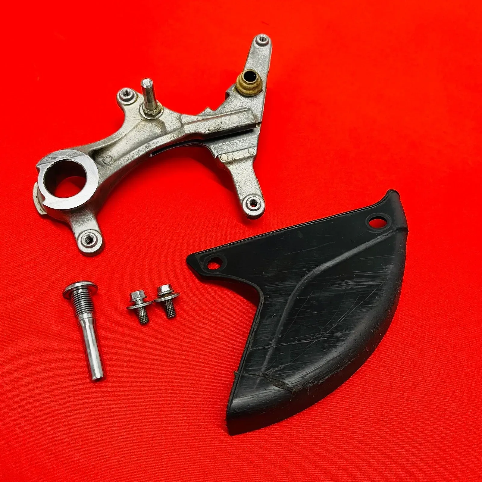 KX250F REAR CALIPER MOUNT BRACKET HANGER GENUINE OEM KAWASAKI KX 250 F (13-18)