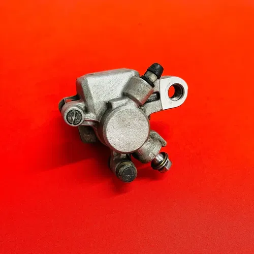 CR85 REAR BRAKE CALIPER COMPLETE GENUINE OEM HONDA CR 80 85 R B (1996-2008)