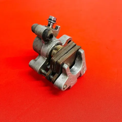 CR85 REAR BRAKE CALIPER COMPLETE GENUINE OEM HONDA CR 80 85 R B (1996-2008)