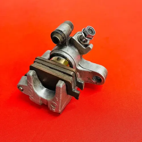 CR85 REAR BRAKE CALIPER COMPLETE GENUINE OEM HONDA CR 80 85 R B (1996-2008)