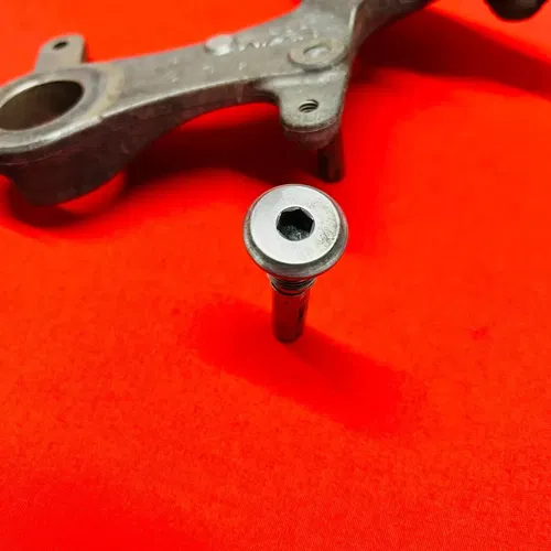 RMZ450 Rear Caliper Mount Bracket Hanger Genuine OEM SUZUKI RMZ 450 (2005-2007)