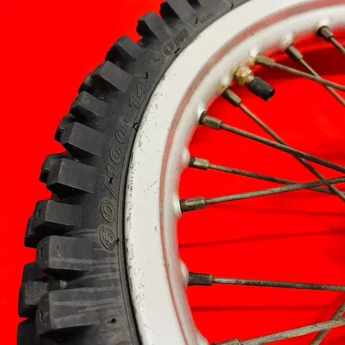 KTM65 FRONT WHEEL COMPLETE 14" RIM TIRE OEM GENUINE KTM 65 SX (03-08)