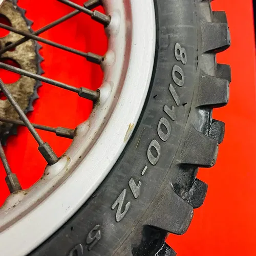 KTM65 REAR WHEEL COMPLETE 12" RIM TIRE OEM GENUINE KTM 65 SX 2003-2008