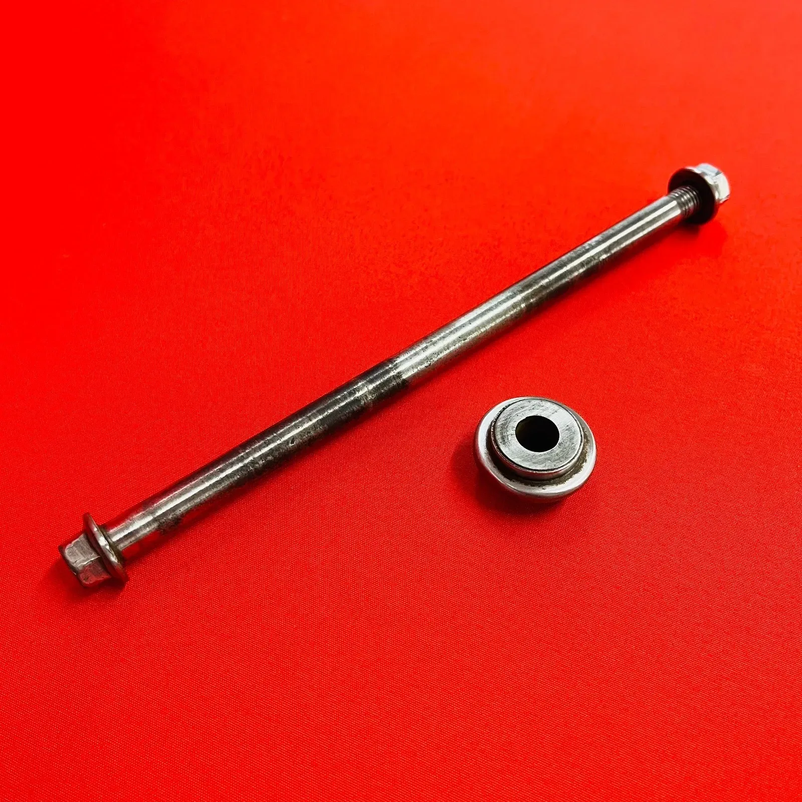 DRZ125 FRONT AXLE WHEEL BOLT COMPLETE OEM GENUINE SUZUKI DR-Z DRZ 125 (03-07)