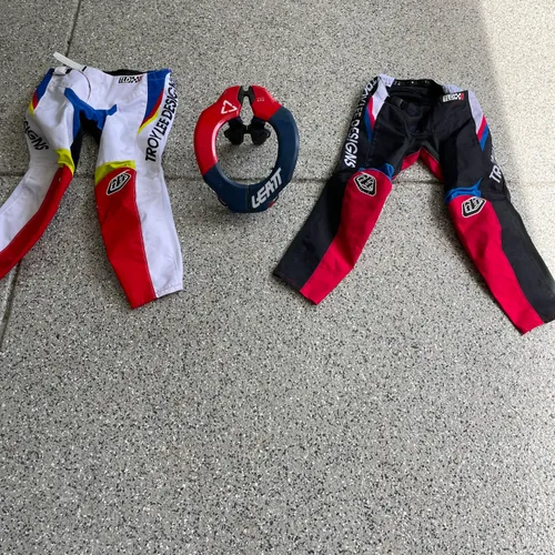 Two Pairs Of Troy Lee, Designs Pants And A Leat Neck Brace