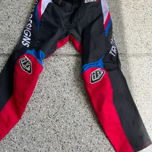 Two Pairs Of Troy Lee, Designs Pants And A Leat Neck Brace