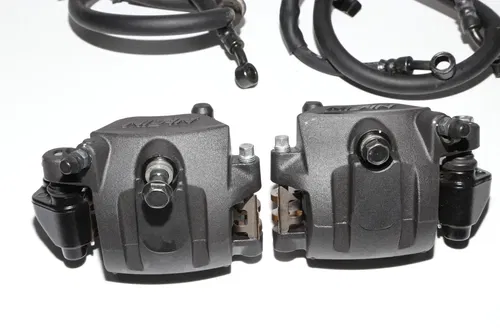21-24 Kawasaki Ninja 650 EX 650 Front Brake Caliper Set Pair Calipers OEM
